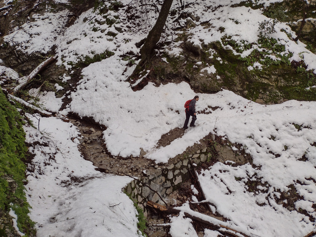 Dima crossing a gully.